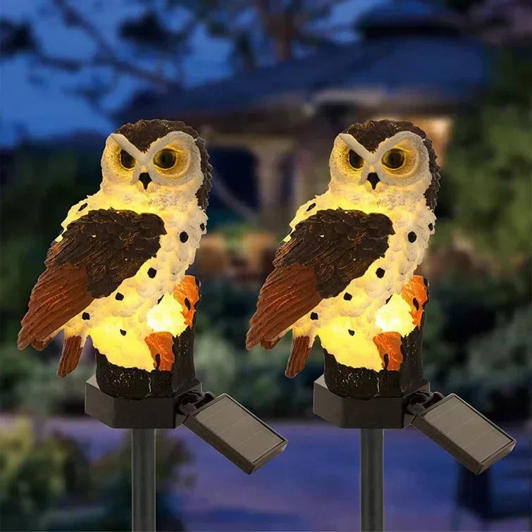 Solar garden light with a decorative pole