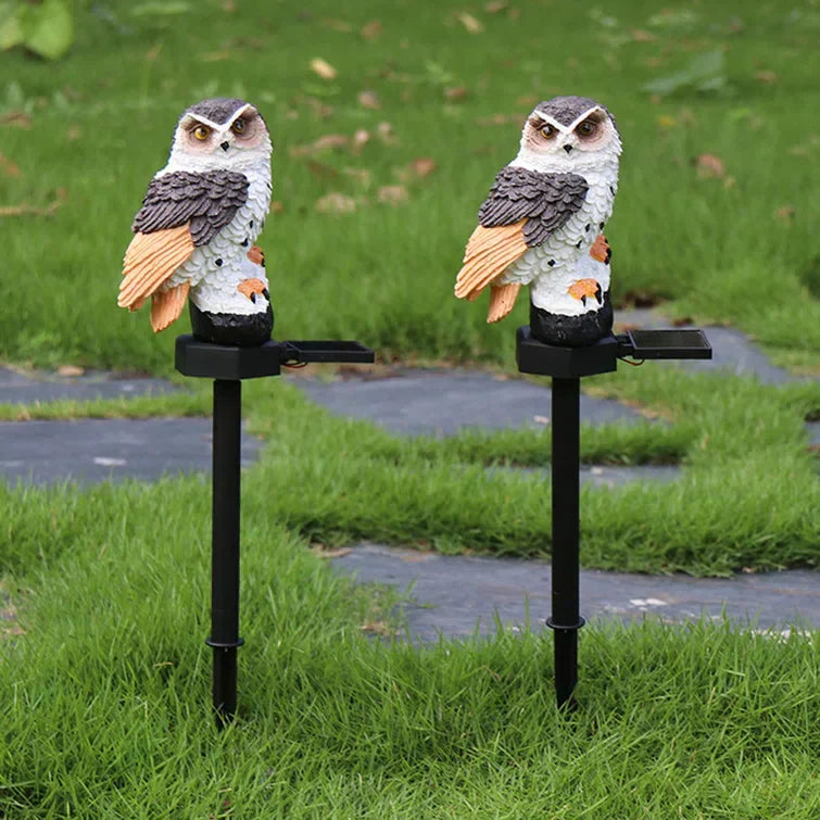 Solar garden light with a decorative pole