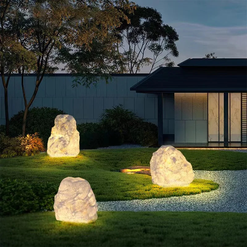 Outdoor garden lamp in the shape of a stone