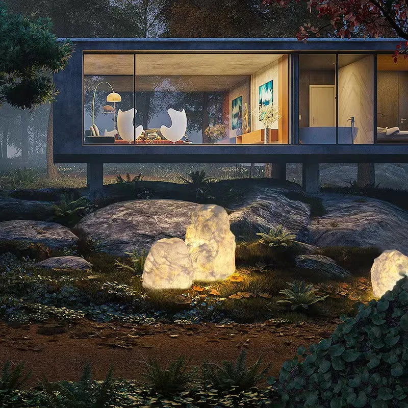 Outdoor garden lamp in the shape of a stone