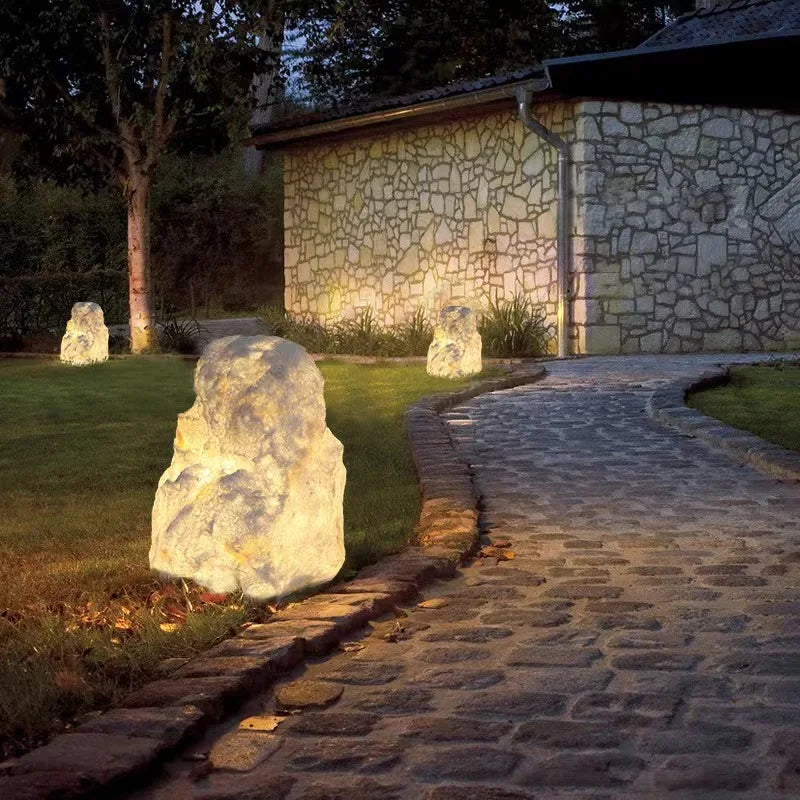 Outdoor garden lamp in the shape of a stone