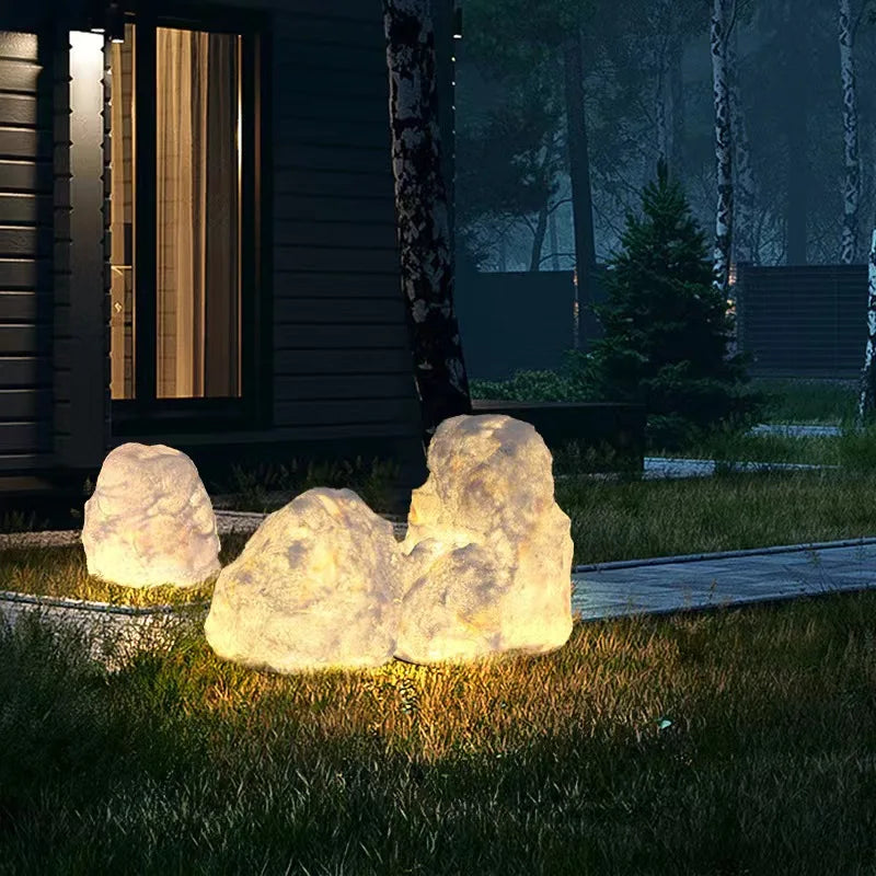 Outdoor garden lamp in the shape of a stone