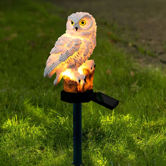 Solar garden light with a decorative pole