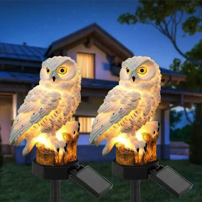 Solar garden light with a decorative pole