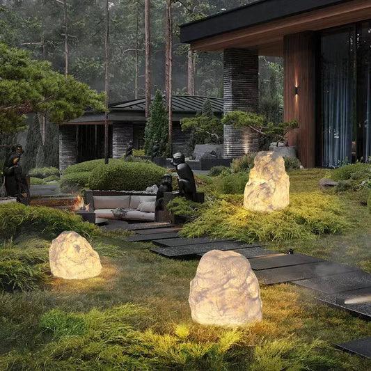 Outdoor garden lamp in the shape of a stone